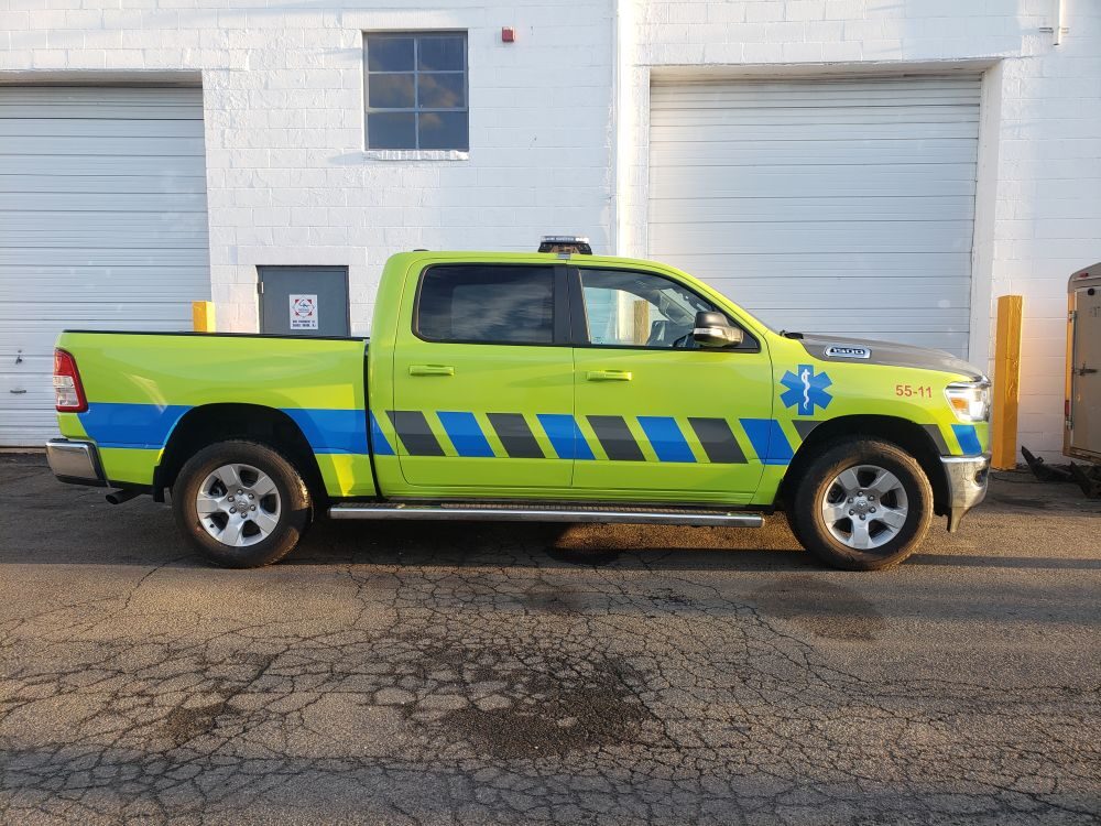 Medical transportation truck wrap and striping