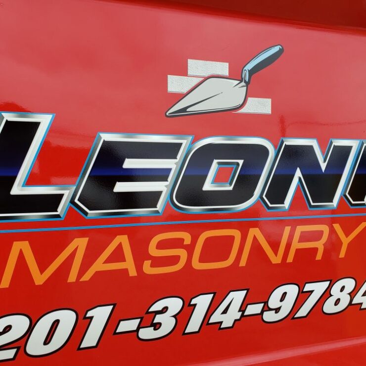 Leoni masonry truck lettering