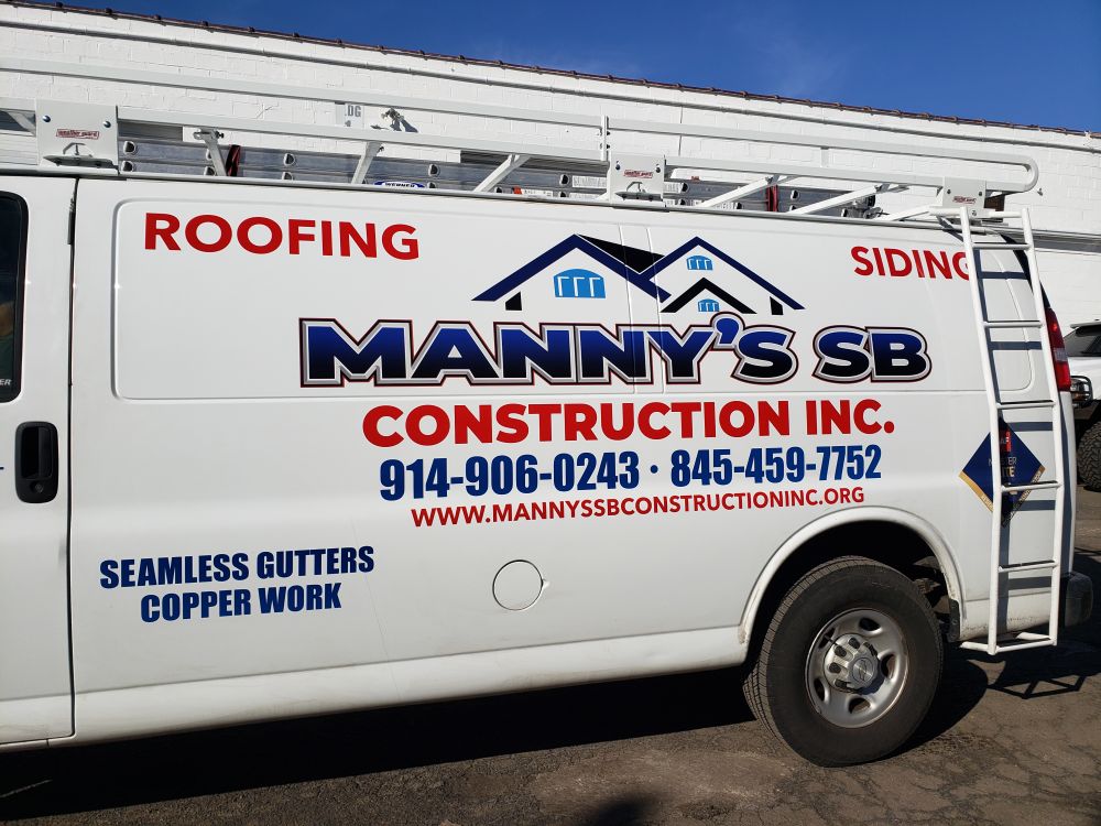 Manny's Construction Chevy Express van lettering and graphics