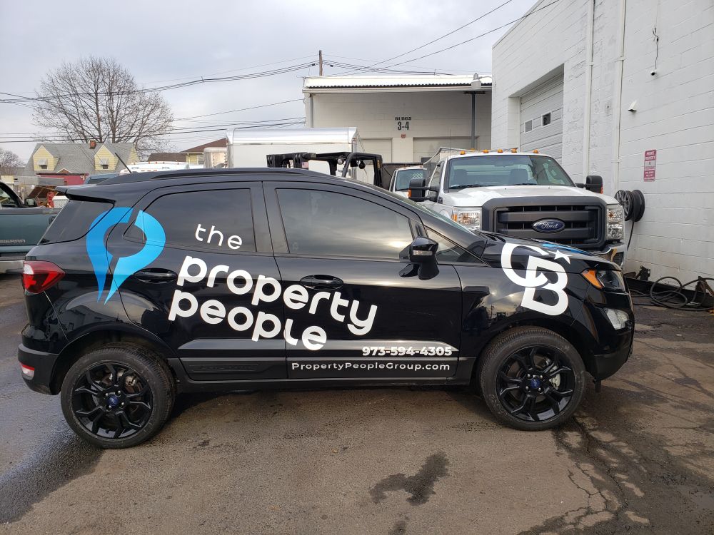The Property People car lettering